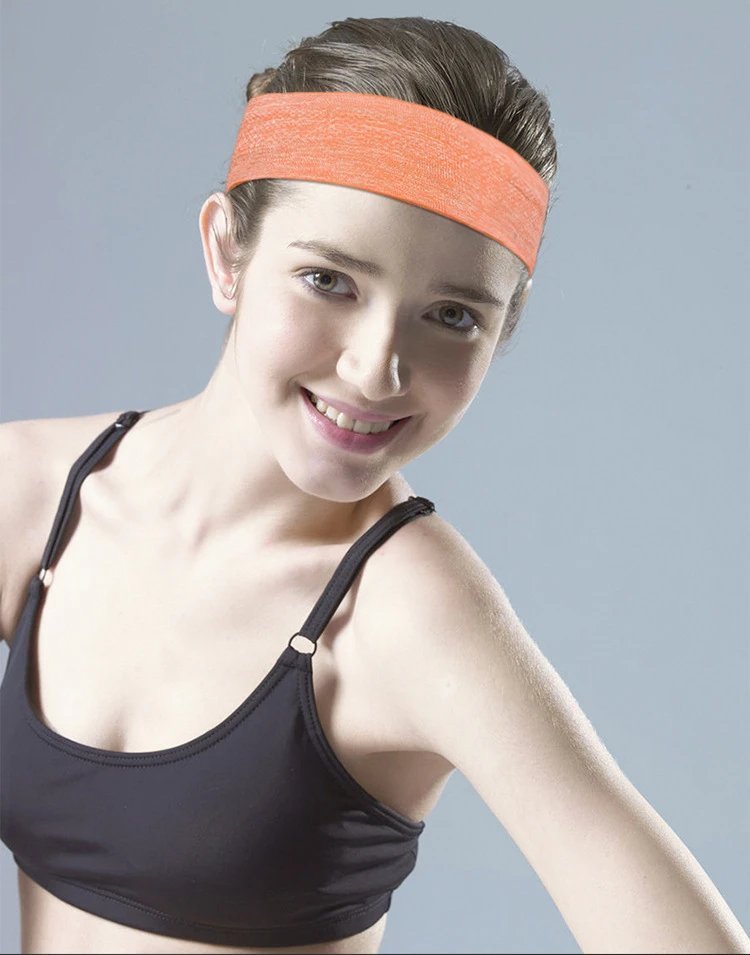 A headband keeps hair in place and absorbs sweat, blending style with function . — HB-80080.2