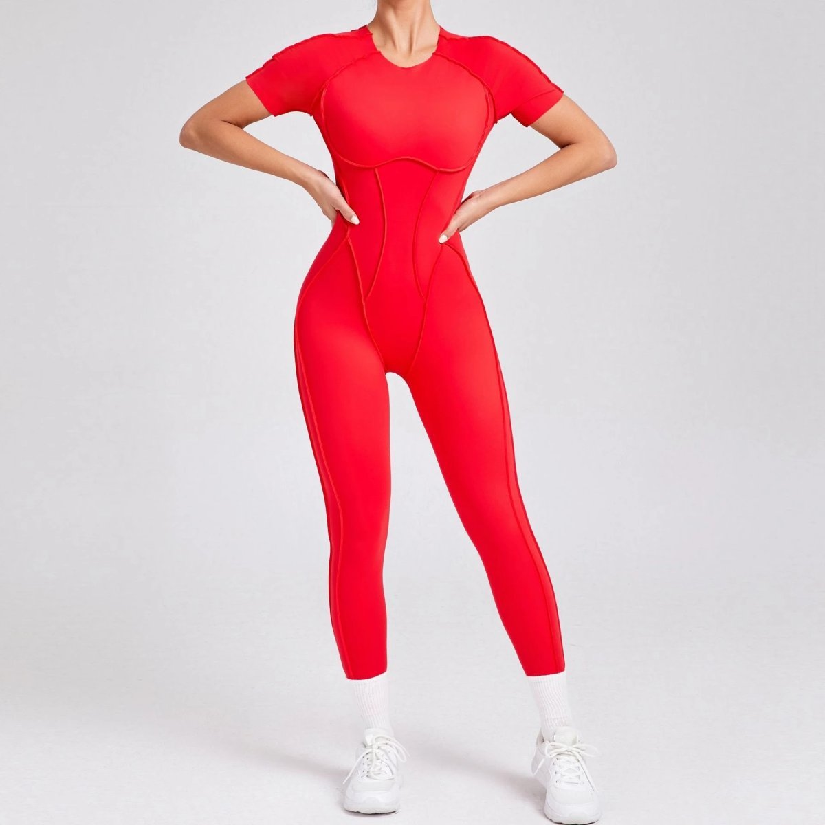 A jumpsuit is a one – piece outfit combining a top and trousers. — O-11831