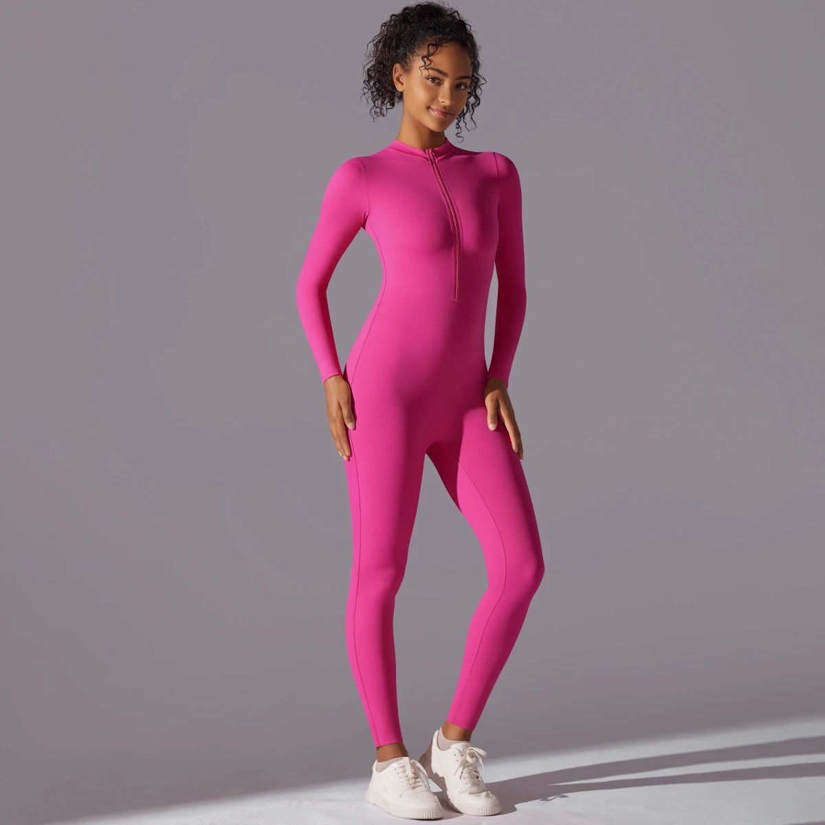 A jumpsuit is a one – piece outfit combining a top and trousers. — O-11839.1