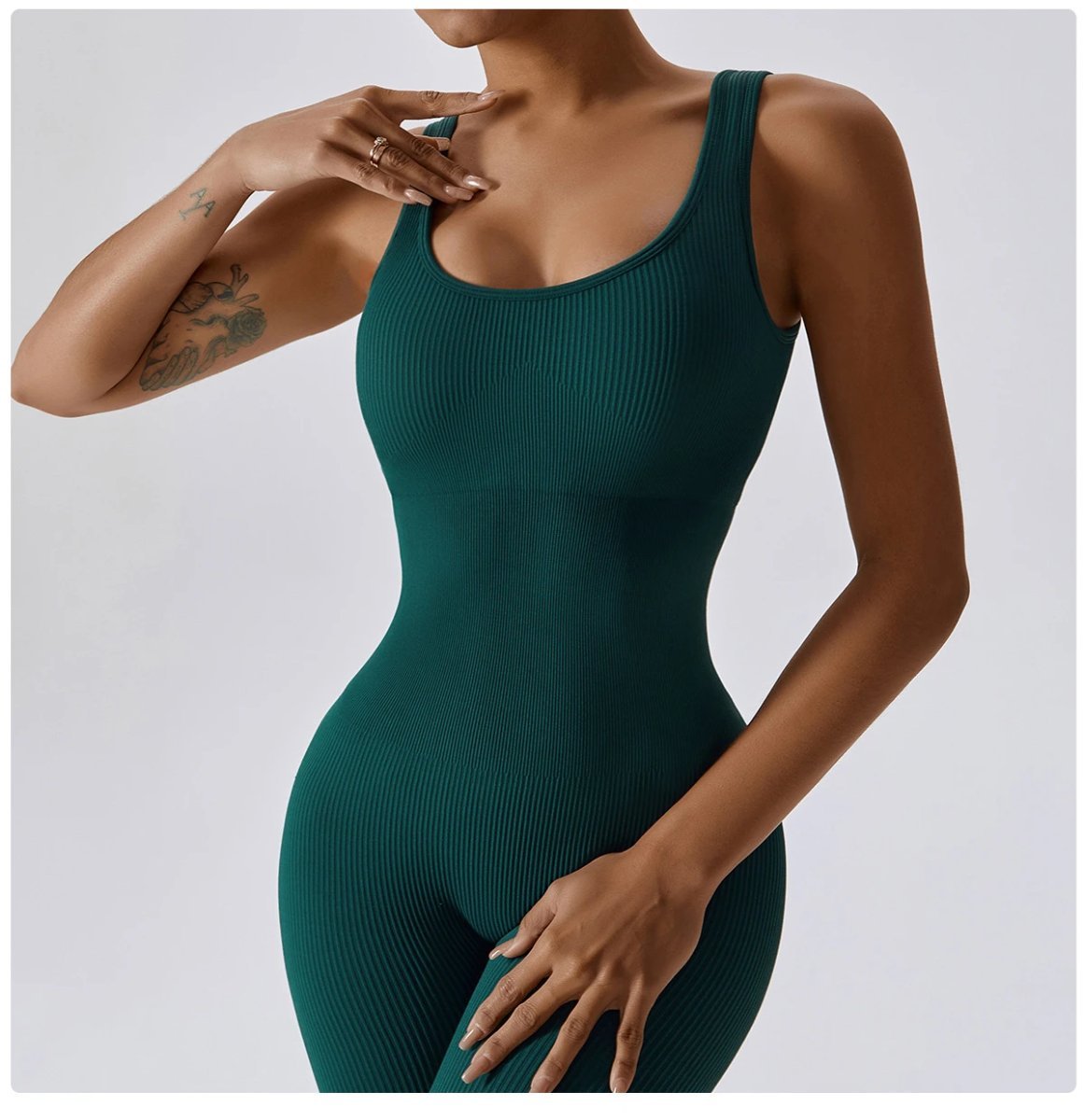 A jumpsuit is a one – piece outfit combining a top and trousers . — O-11870