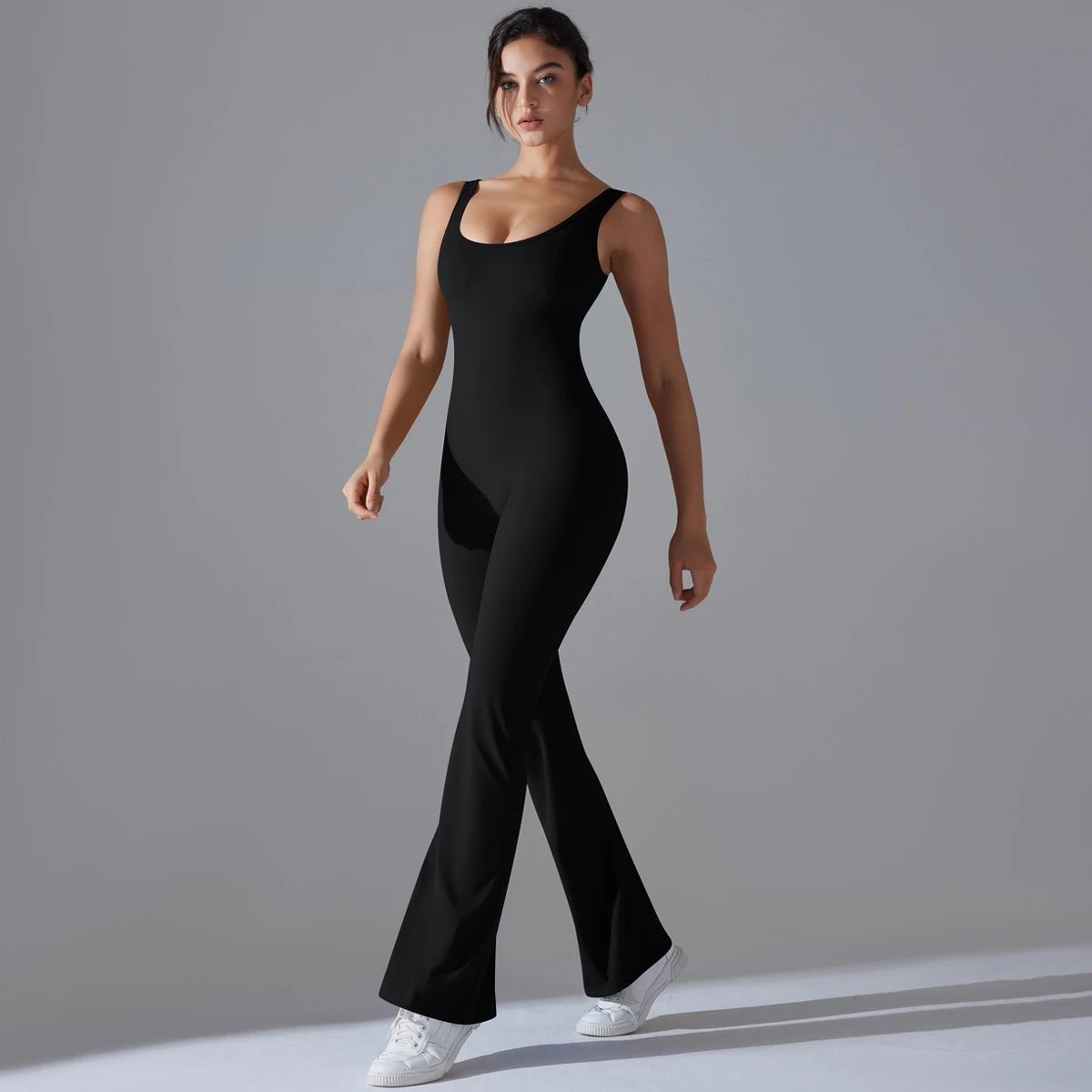 A jumpsuit is a one – piece outfit combining a top and trousers . — O-11889