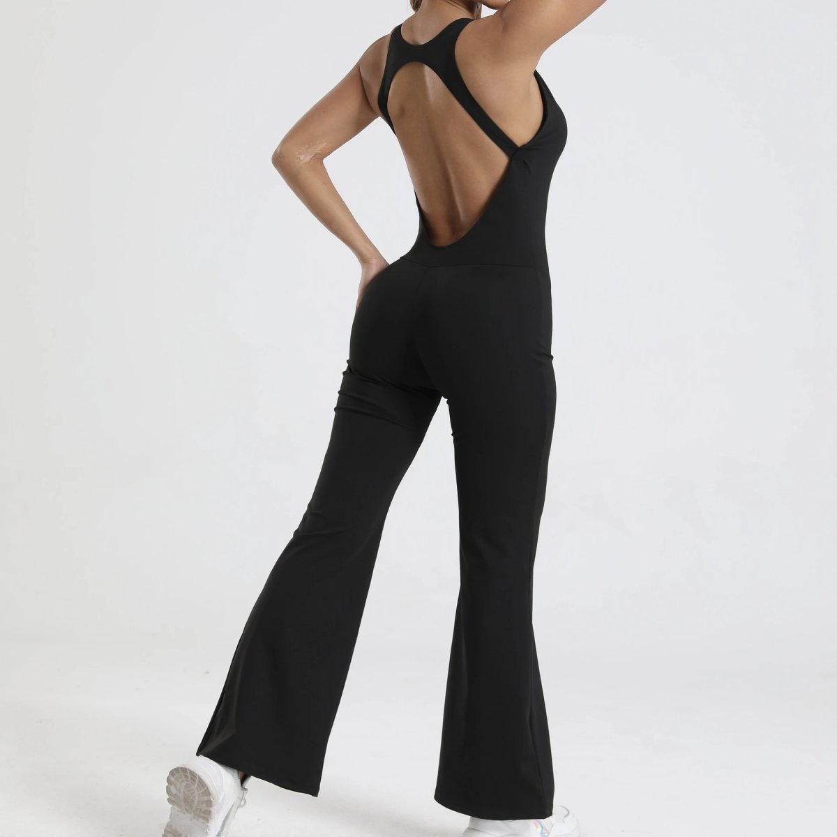A jumpsuit is a one – piece outfit combining a top and trousers. — O-12011