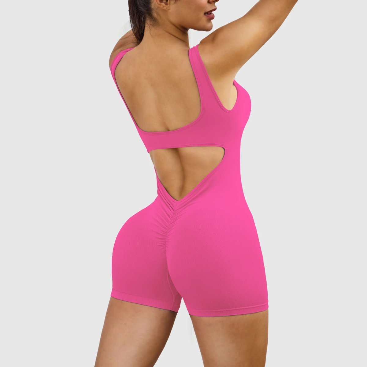A jumpsuit is a one – piece outfit combining a top and trousers. — O-12036