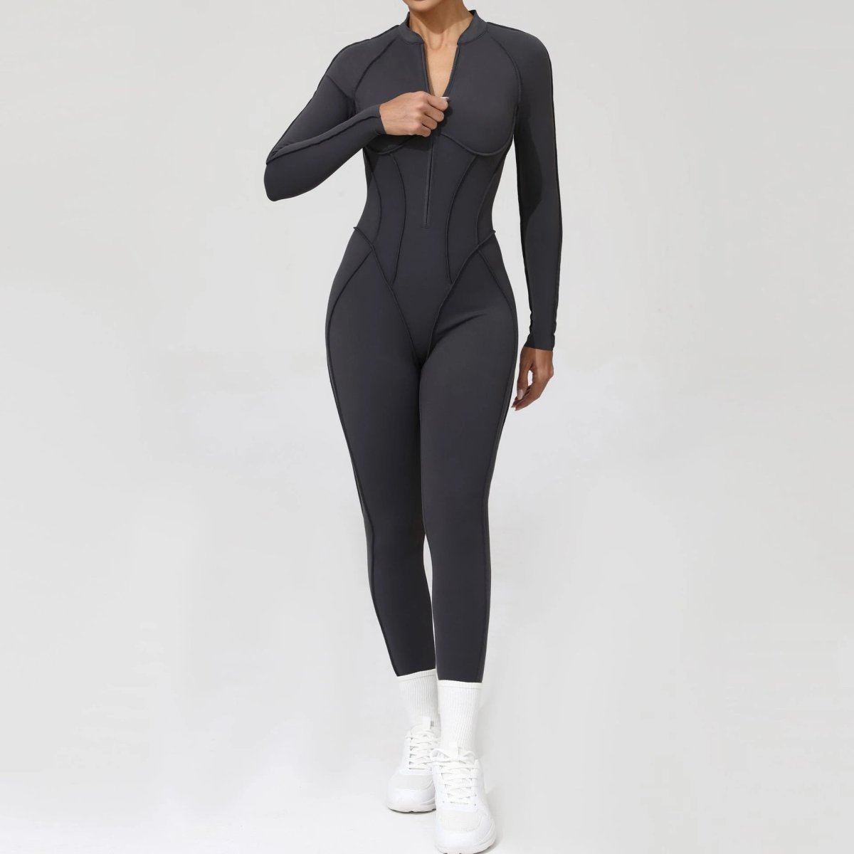 A jumpsuit is a one – piece outfit combining a top and trousers . — O-12060
