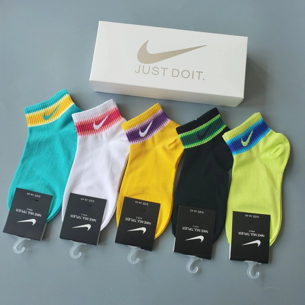 socks are soft coverings worn on the feet to provide comfort. — SOCKS-57017