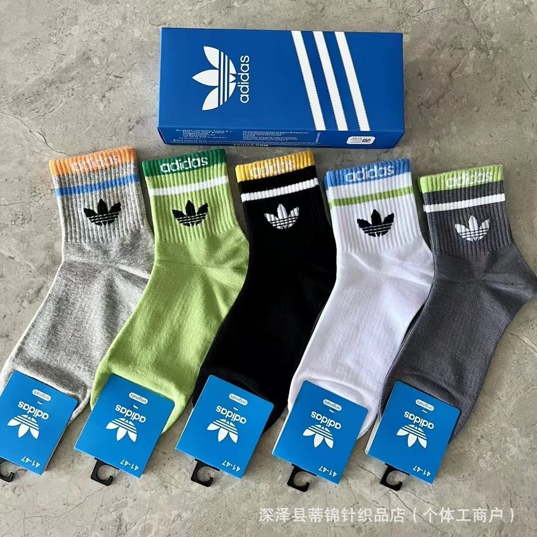 socks are soft coverings worn on the feet to provide comfort. — SOCKS-57077