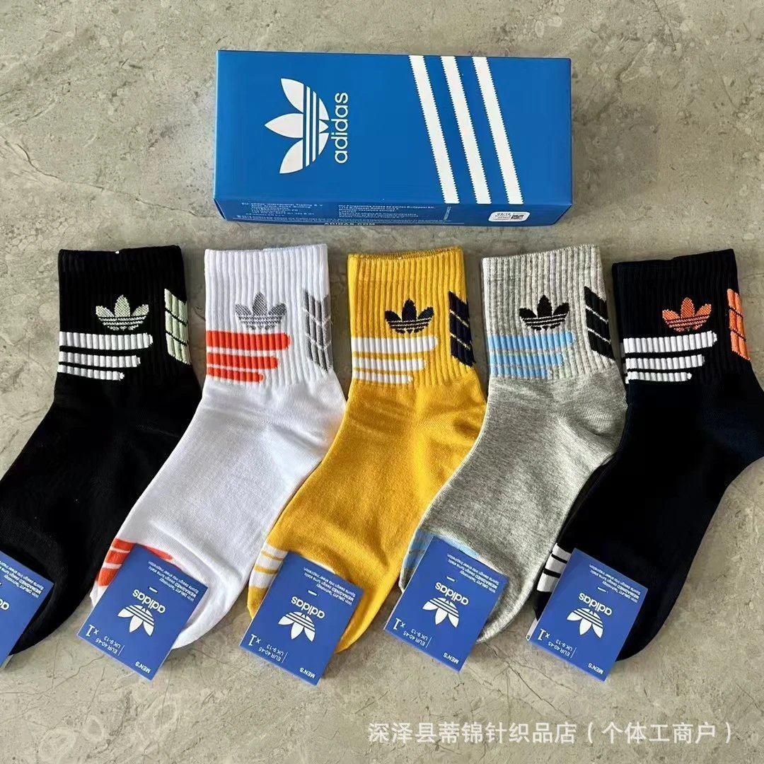 socks are soft coverings worn on the feet to provide comfort. — SOCKS-57078