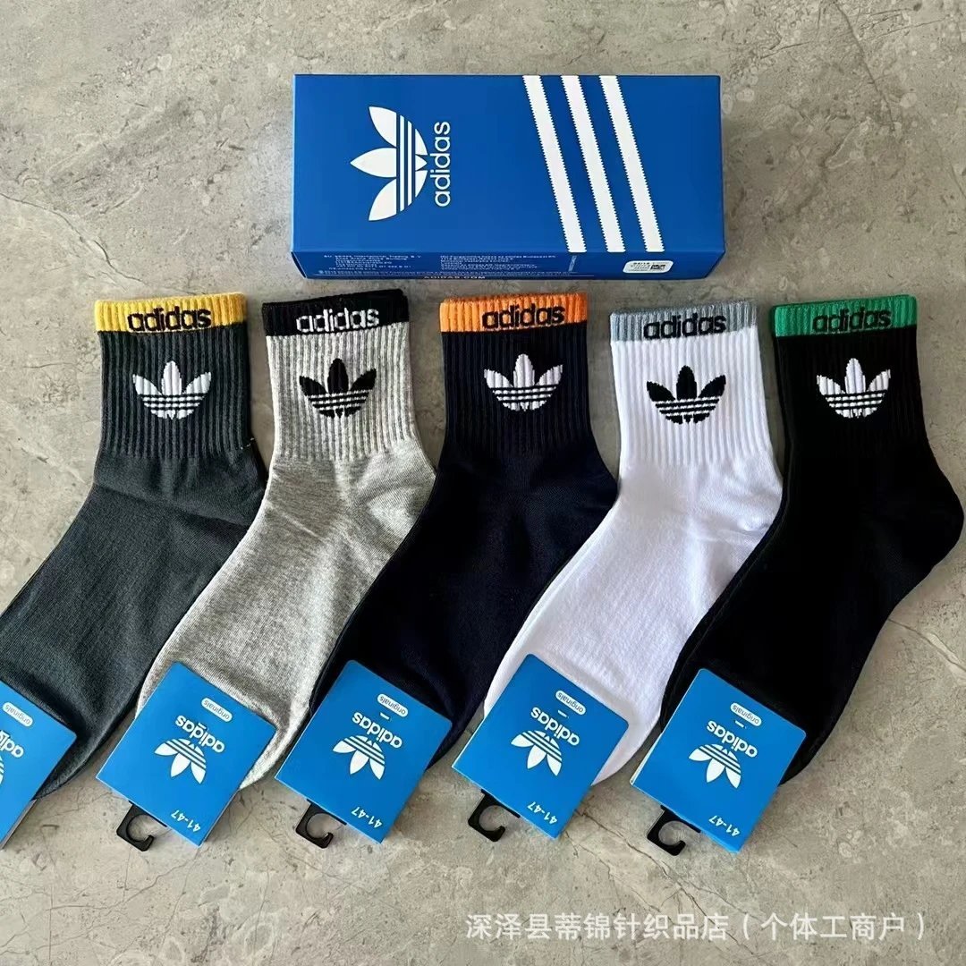 socks are soft coverings worn on the feet to provide comfort. — SOCKS-57080