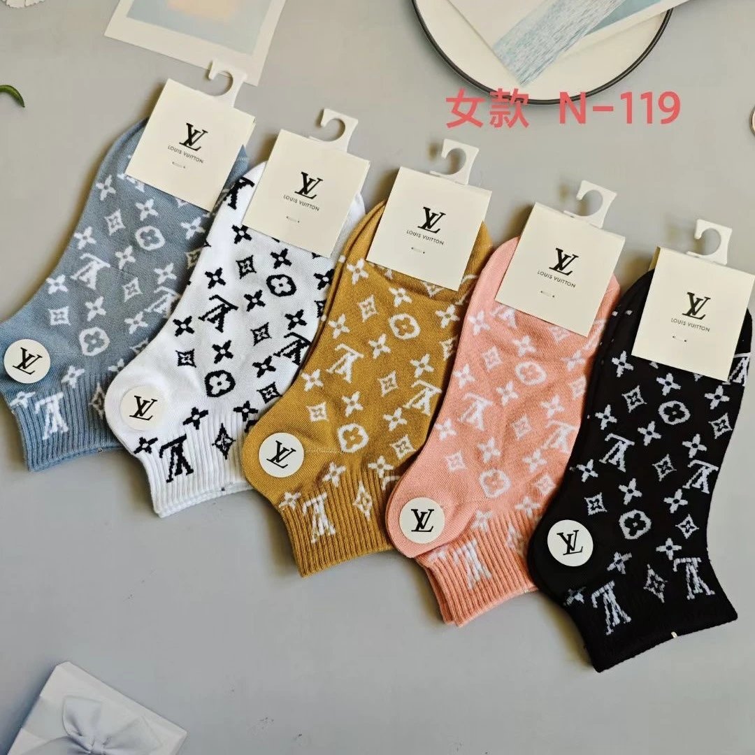 socks are soft coverings worn on the feet to provide comfort. — SOCKS-57083